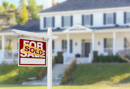 Sold sign in front of new house in Saratoga NY